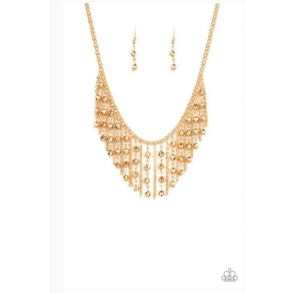 Paparazzi Rebel Remix Gold Necklace & Earrings Set  Stands of faceted gold beads and glistening gold chains stream from a matching gold chain, creating an edgy fringe below the collar. Features an adjustable clasp closure.