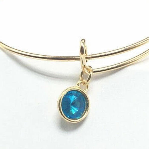 Gold Wire Bracelet with Lake Blue Charm