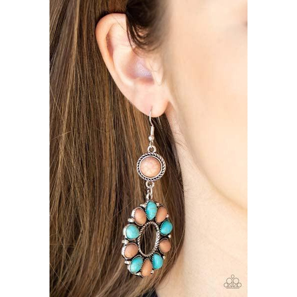 Paparazzi Back At The Ranch Multi Color Pierced Earrings  An earthy collection of brown and turquoise teardrop stones fans out from a textured silver ring. The scalloped floral frame dangles from a round brown stone encased in a braided silver fitting for a down-to-earth finish. Earring attaches to a standard fishhook fitting.