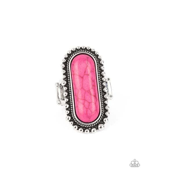 Paparazzi Sedona Scene - Pink Stretch Ring  An oblong pink stone is nestled inside an oversized studded silver frame, creating a colorfully rustic centerpiece atop the finger. Features a stretchy band for a flexible fit.
