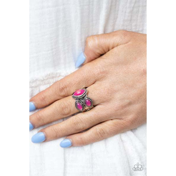 Paparazzi The Charisma Collector – Pink Stretch Ring  A trio of glassy Raspberry Sorbet marquise beads embellish the front of a hammered silver band etched in faux layers, creating an ethereal display atop the finger. Features a stretchy band for a flexible fit.  Sold as one individual ring.