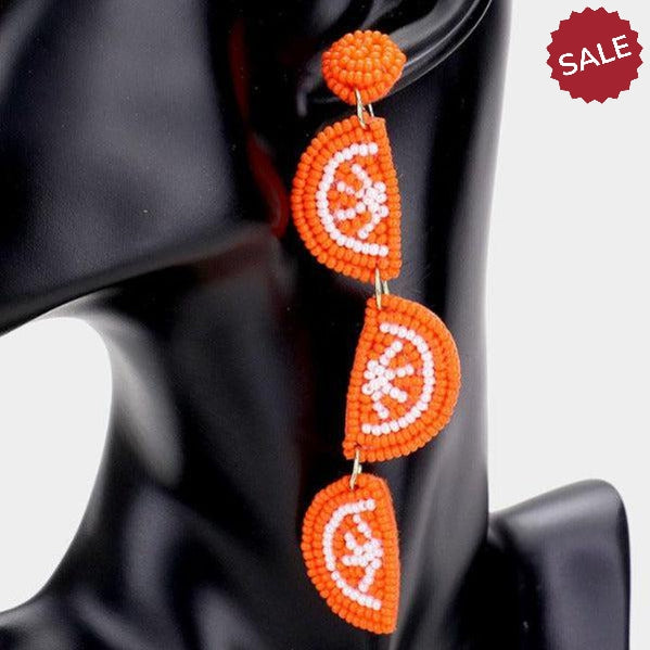 Triple Orange Bead Felt Back Earrings by Treasure Jewelry