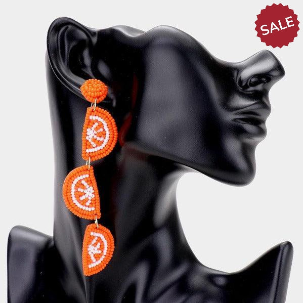 Triple Orange Bead Felt Back Earrings by Treasure Jewelry
