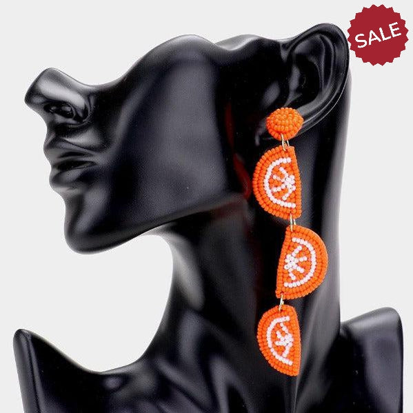 Triple Orange Bead Felt Back Earrings by Treasure Jewelry