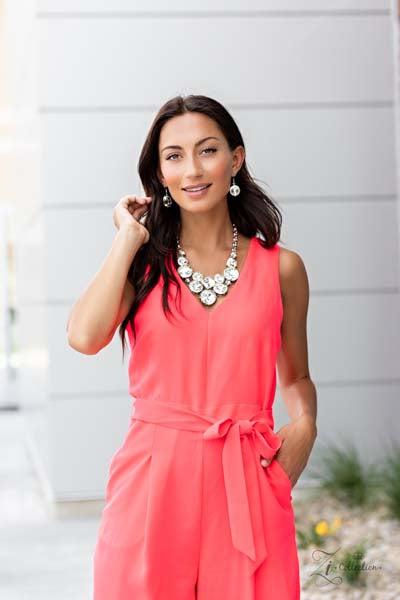 Zi Collection "Unpredictable" Necklace & Earrings Set  Varying in size and shape, a dramatic collision of oversized white rhinestones connect into an unapologetically glamorous statement piece below the collar. Attached to chunky silver links, the breathtaking display of clustered gems radiates confidence. Features an adjustable clasp closure.